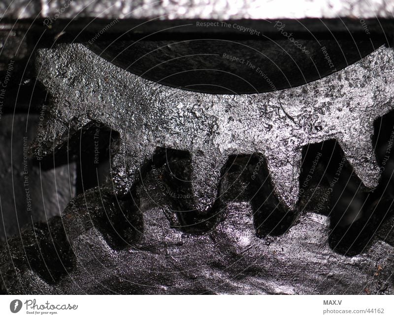 Kraftübertragung schwarz drehen Elektrisches Gerät Technik & Technologie Zahnrad Metall Walzwerk Bewegung Zähne