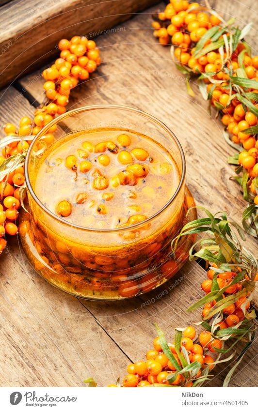 Herbstliche Sanddornmarmelade Marmelade Beeren Vitamin hippophae Lebensmittel bewahren Gesundheit Frucht frisch reif Ast natürlich geschmackvoll gelb süß saftig