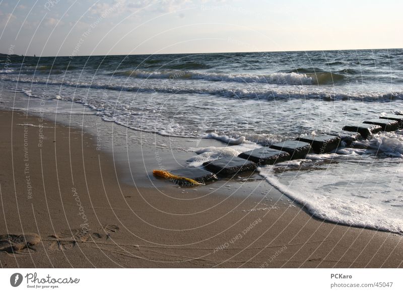 am Meer Strand Morgen Sonnenaufgang Wolken Spaziergang gelb Sylt Ferien & Urlaub & Reisen Rauschen Weitwinkel Stein blau Sand Wasser