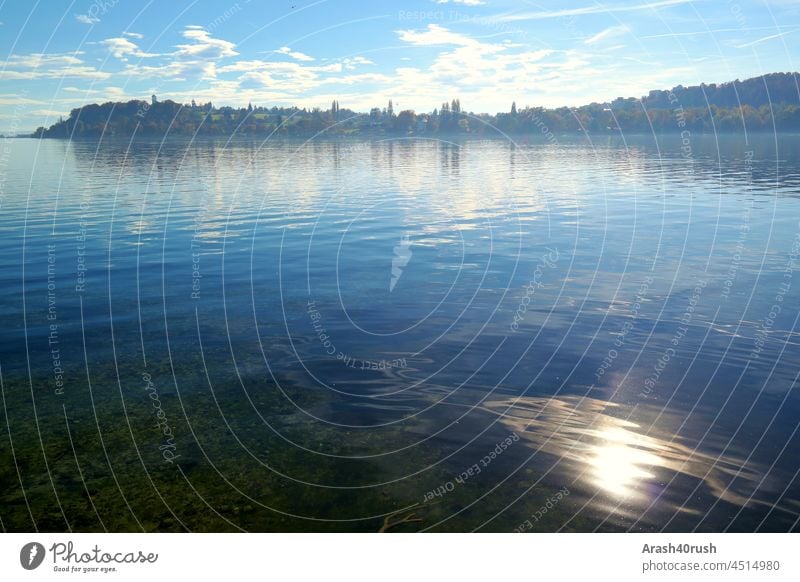 Schöner Ausblick von der Mainau Wasser Sonne Außenaufnahmen Natur Landschaft Himmel blau wolken Erholung Spiegelung sehen traumhaft freiheit Herausragend