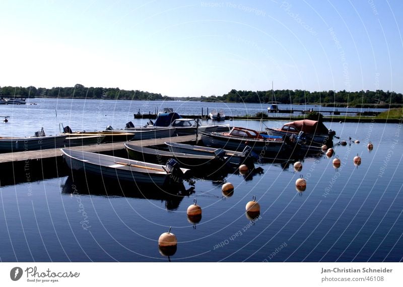 Bööte Wasserfahrzeug Ferien & Urlaub & Reisen Steg Himmel Schweden blau Sonne