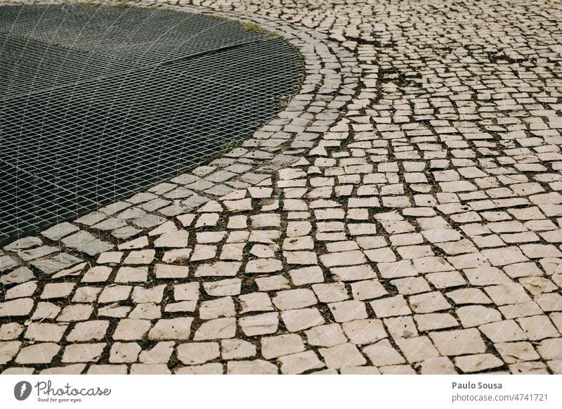 Mosaik auf dem Gehweg Bürgersteig Straßenbelag Stein Kopfsteinpflaster Pflastersteine Wege & Pfade Verkehrswege Menschenleer Strukturen & Formen Außenaufnahme