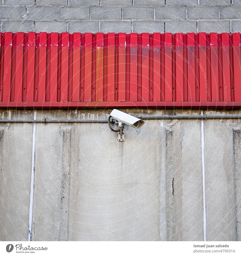 Videokamera an der Wand Fotokamera Überwachungskamera Hintergrund Straße Sicherheit Gerät Schutz Technik & Technologie System Kontrolle bewachen Nocken