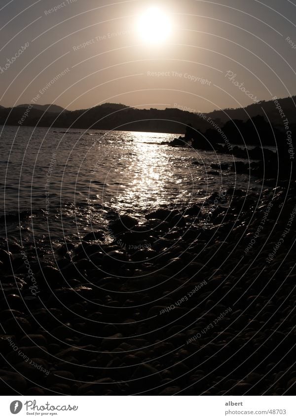 Malles Sonnenuntergang Dämmerung Strand Meer Mallorca Paguera dunkel Wasser