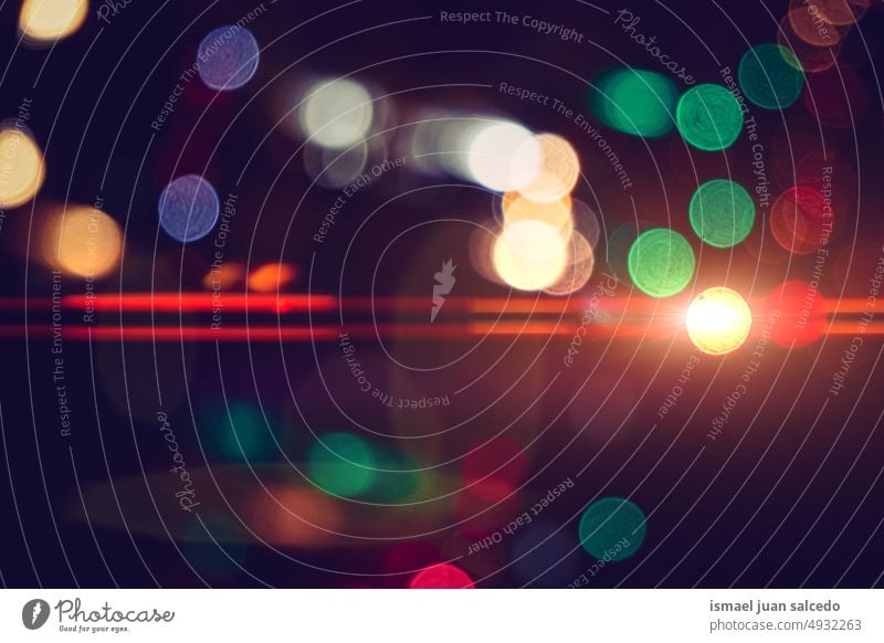 Straßenbeleuchtung in der Stadt bei Nacht Lichter Straßenlaternen Farben farbenfroh mehrfarbig Bokeh Kreise hell glänzend Unschärfe verschwommen defokussiert