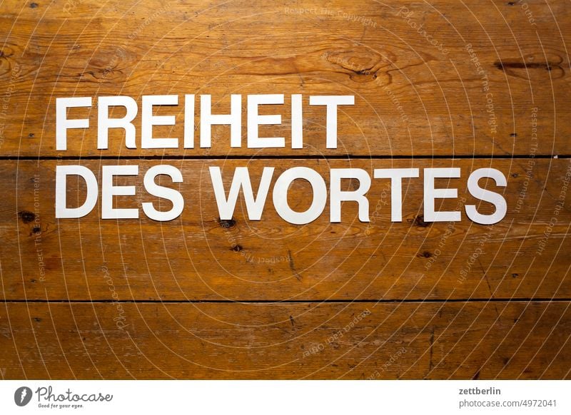 FREIHEIT DES WORTES abstrakt aussage begriff botschaft buchstabe einzelbuchstabe parole passwort satz satzschrift schlüsselwort schreiben setzerei slogan text