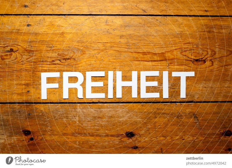 FREIHEIT abstrakt aussage begriff botschaft buchstabe einzelbuchstabe parole passwort satz satzschrift schlüsselwort schreiben setzerei slogan text txypo