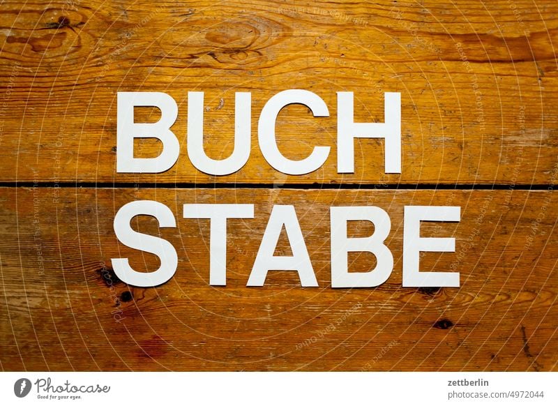 BUCHSTABE abstrakt aussage begriff botschaft buchstabe einzelbuchstabe parole passwort satz satzschrift schlüsselwort schreiben setzerei slogan text txypo