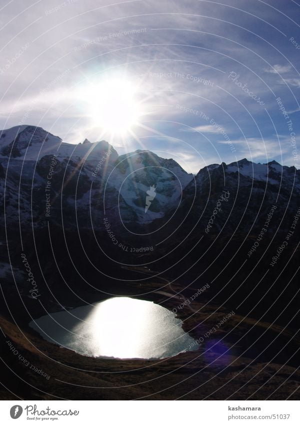 Bergsee Sonne Schnee Berge u. Gebirge Natur Landschaft Wasser Himmel Horizont Sonnenaufgang Sonnenuntergang Sonnenlicht Eis Frost Felsen Alpen Gipfel