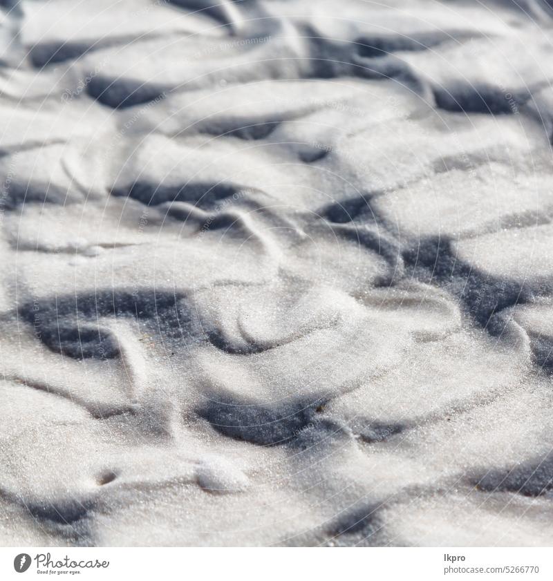 und die abstrakte Textur des weißen Strandes Sand Hintergrund sandig Düne Natur wüst texturiert trocken unfruchtbar schön tropisch dreckig Zement Kieselsäure