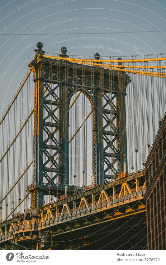 Manhattan-Hängebrücke bei Sonnenuntergang Manhattan Bridge Konstruktion Gebäude Großstadt Architektur Suspension Infrastruktur berühmt urban Straße Struktur