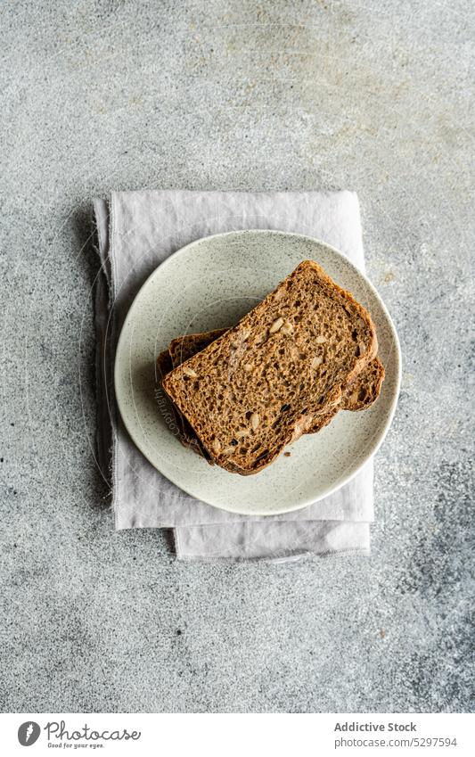 Gesunde Roggenbrot-Scheiben Hintergrund backen Holzplatte Brot Beton Diät essen Essen Lebensmittel frisch gebacken Gesundheit Keton Küche Mahlzeit Serviette