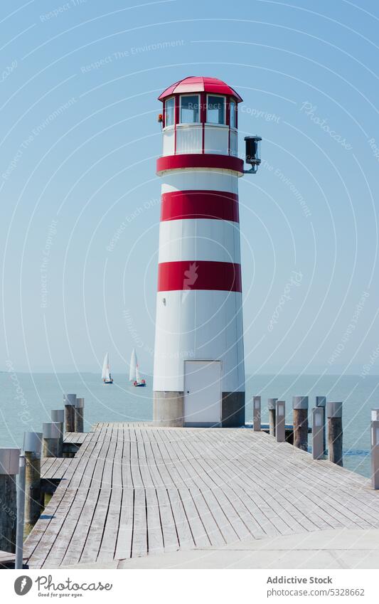 Bild eines Leuchtturms in Österreich architektonisch Portwein maritim reisen Pier romantisch MEER niemand Architektur Ufer Wasser Licht Natur Leberfleck Ort