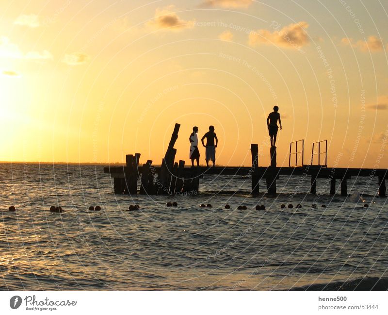 mexican sunset Meer Steg Stimmung Sonnenuntergang Mann Licht Mexiko isla Insel Wasser Kuba isal mujeres Schatten sundown