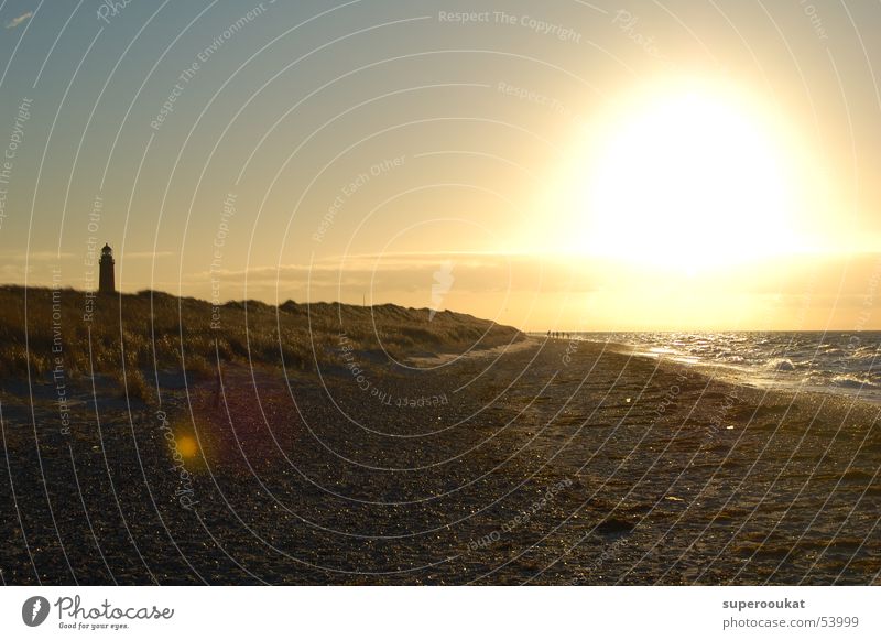 Darsser Westkueste Gegenlicht Strand Meer Brandung Leuchtturm Wolken Lichtfleck Einsamkeit Abendsonne Sonnenuntergang Himmel Stranddüne Natur Blendenfleck