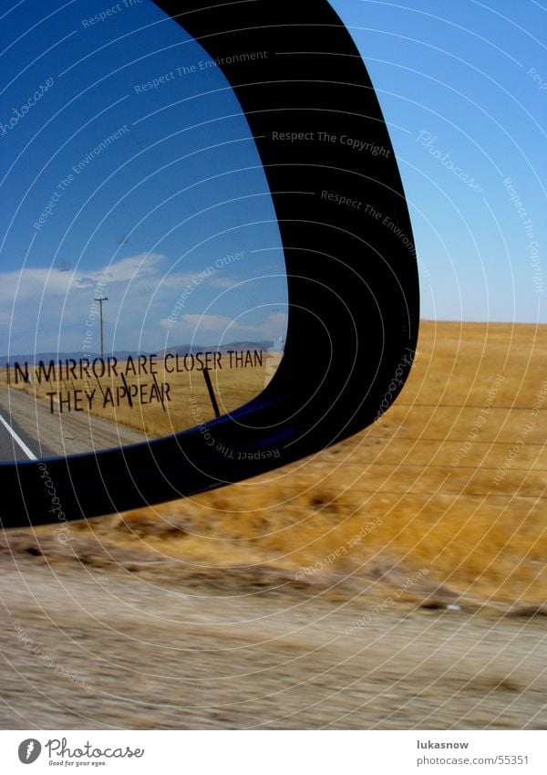 on the road Rückspiegel Spiegel Gras trocken Geschwindigkeit Himmel Wolken Ferien & Urlaub & Reisen fahren porsche mirror rear view mirror Landschaft