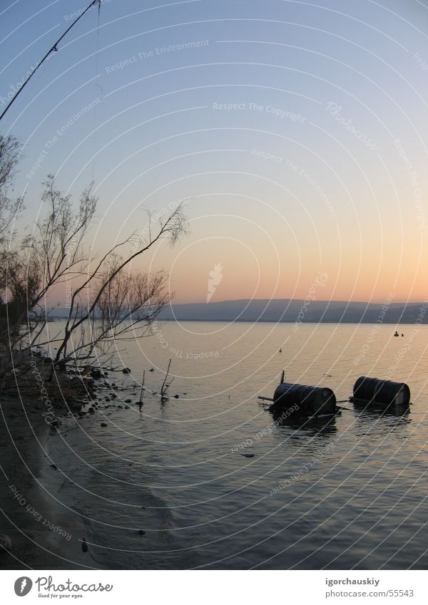 Lake at sunset Sonnenuntergang lake water barells trees sundown fishing plot sea of galilee