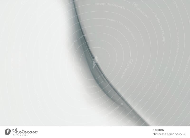 grauer abstrakter Hintergrund aus geschwungenen Linien von geometrischen Formen Abstraktes Muster Architektur blanko Unschärfe verschwommen
