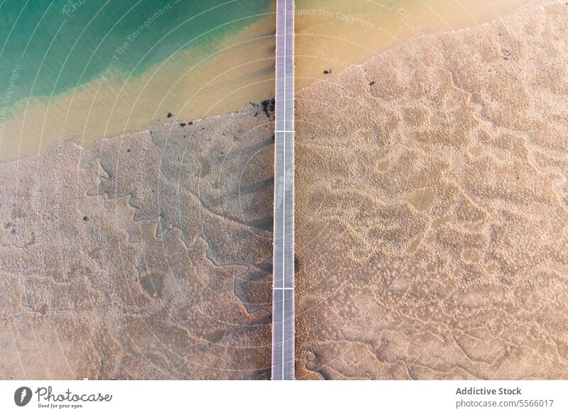 Pier zum Meer mit Sandstrand MEER rau Ufer Uferlinie hafen Küste Sommer el rompido Huelva Spanien Europa Insel Tourismus aqua Wasser Abenteuer Resort tagsüber