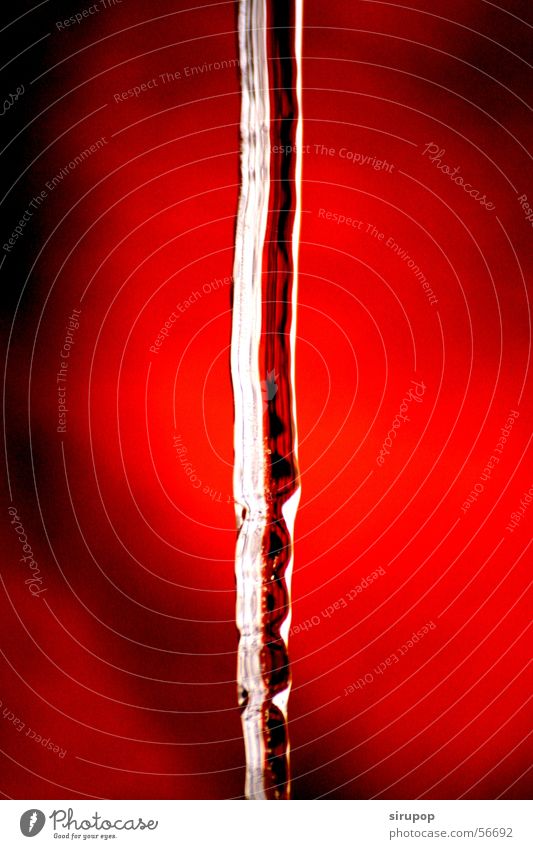 Warmes eis 2 Eiszapfen rot Physik schwarz Wärme