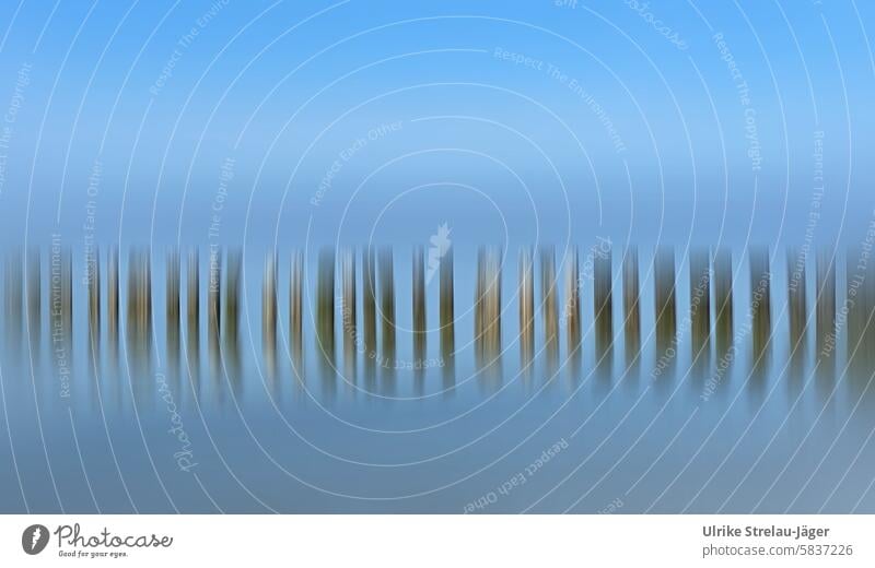 Nordsee | Holzpfähle bei Flut mit Bewegungsunschärfe Landschaft Meereslandschaft Wasser Küstenlinie malerisch Urlaub idyllisch Windstille harmonisch Harmonie