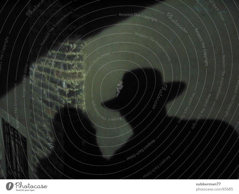 Schattenmann Schattenspiel Mann Angst Hut