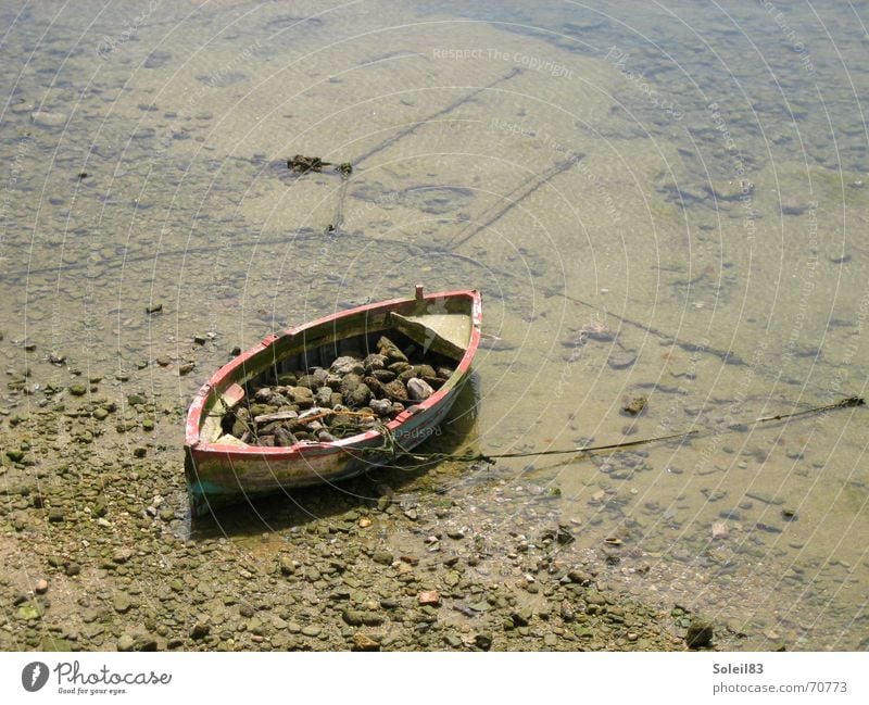 Don't get away Wasserfahrzeug Meer Strand Ruderboot Anker Ebbe Stein Sand