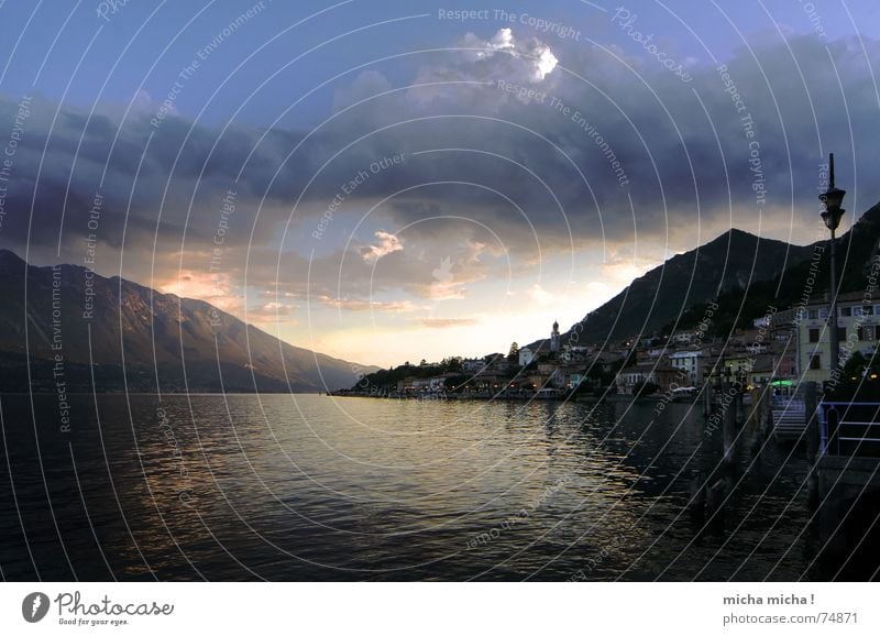 Abend am See Gardasee Sonnenuntergang Italien Lampe Haus Wolken ruhig Gelassenheit Erholung Spaziergang Ferien & Urlaub & Reisen Berge u. Gebirge Wasser Licht