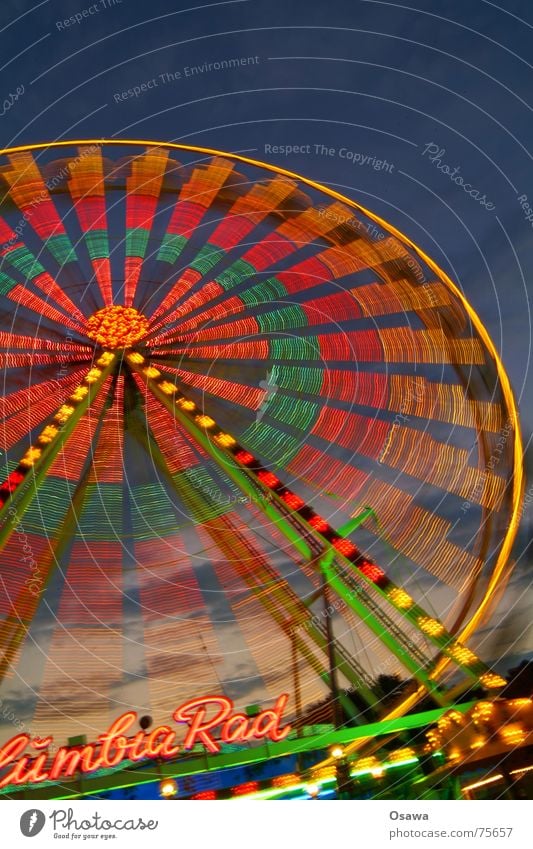 Wir drehen uns im Kreis... Part 2 Riesenrad Jahrmarkt rund Leuchtspur Dämmerung Fahrgeschäfte Karussell Bewegung Licht Abenddämmerung