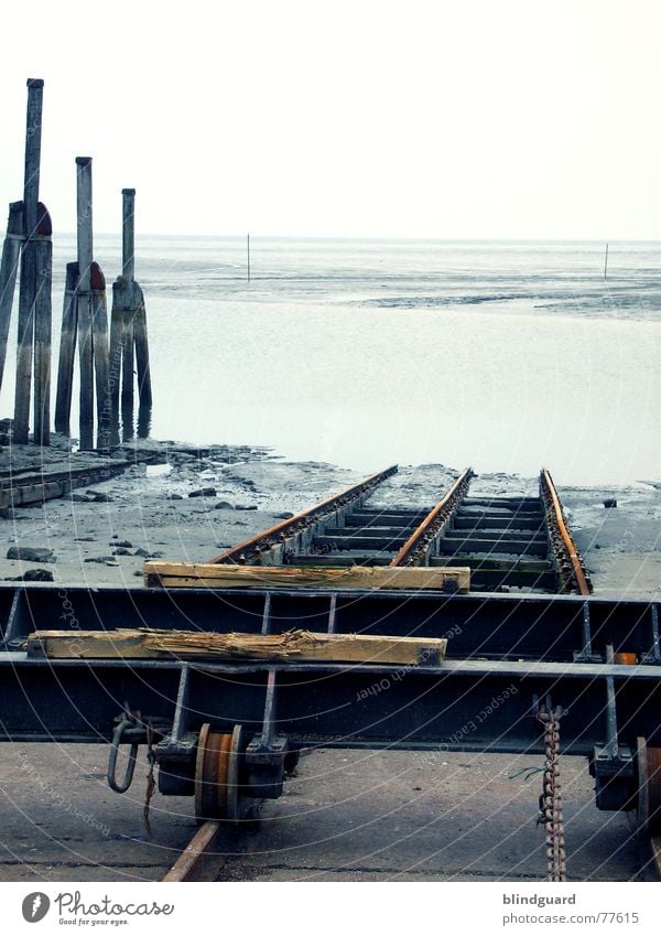 Trockendock Gleise Wasserfahrzeug Reparatur Neuharlingersiel Meer Ebbe Horizont slipanlage Kette Nordsee Flut Sand marschieren Schiffswerft Wattenmeer Wind