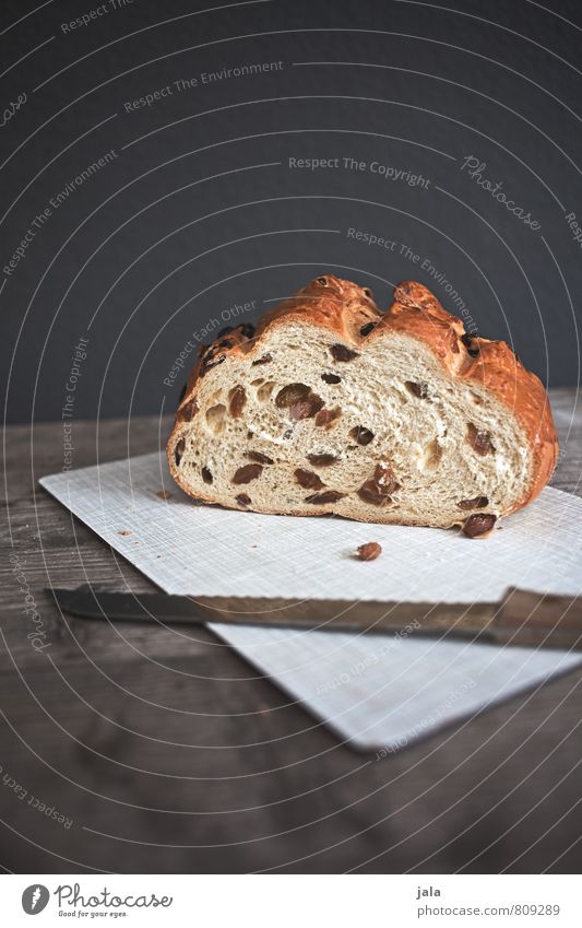 rosinenstuten Lebensmittel Teigwaren Backwaren Kuchen Ernährung Frühstück Kaffeetrinken Vegetarische Ernährung Messer Schneidebrett frisch lecker natürlich