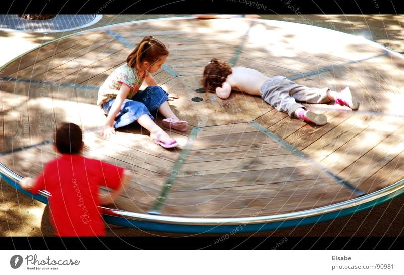 Sonntag Kind Karussell Spielen Licht Sonnenfleck Spielplatz Freizeit & Hobby Paris lustig Jahrmarkt