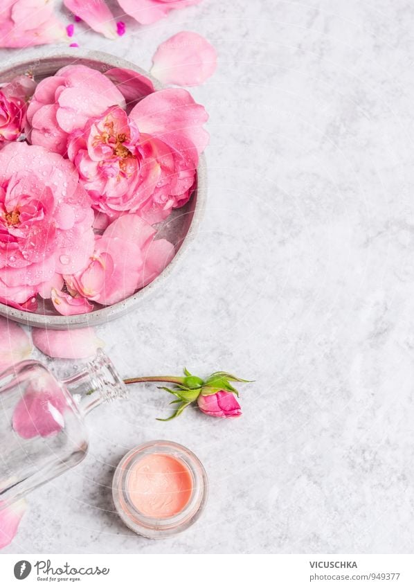 Roses in grauem Schüssel mit Wasser und Creme Stil Design schön Körperpflege Haut Gesicht Kosmetik Parfum Schminke Wellness Leben Wohlgefühl Duft Spa Massage