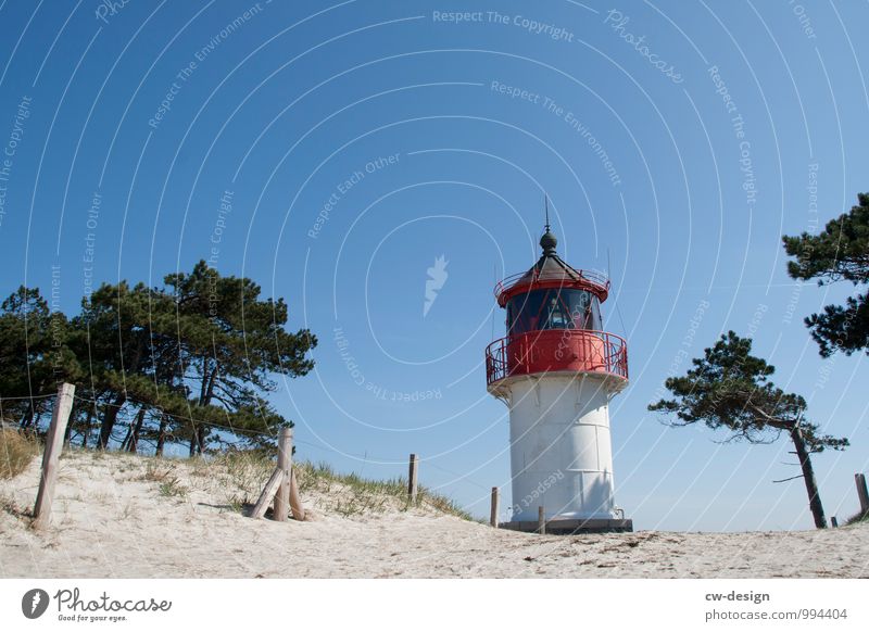 Leuchtturm am Strand Leuchtfeuer Küste Außenaufnahme Himmel Landschaft Farbfoto Natur Ferien & Urlaub & Reisen Tourismus Wolkenloser Himmel wolkenlos