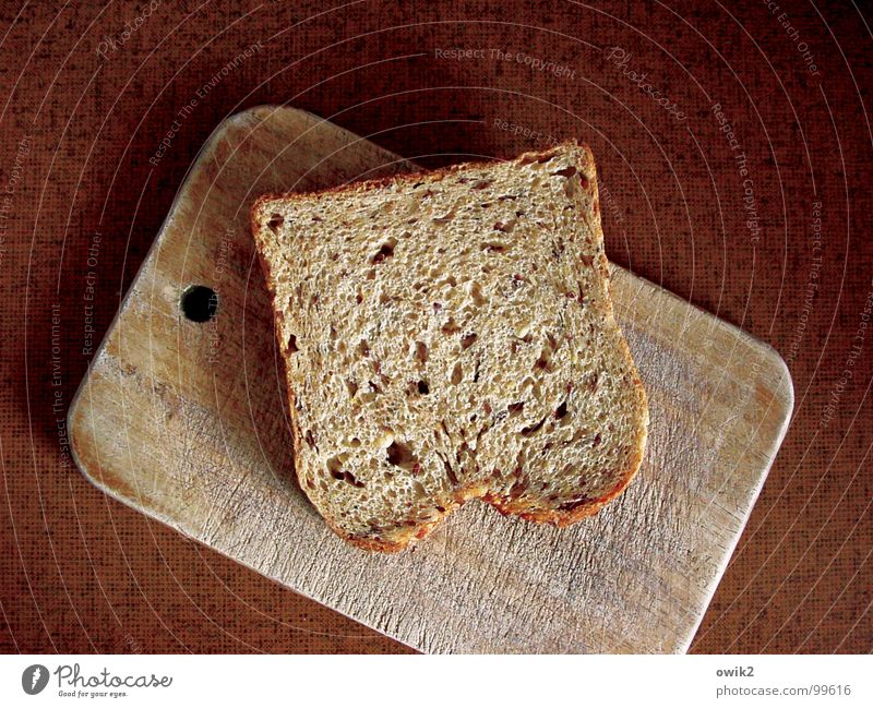 Stulle Teigwaren Backwaren Brot Schnitte Frühstück Schneidebrett Design Küche Gastronomie Tischplatte Resopal Holz Kunststoff füttern braun Selbstbeherrschung