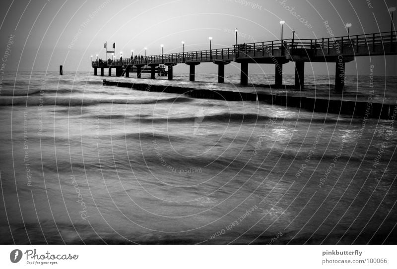 On a dark night.... Horizon Ocean Pond Lake Body of water Waves Wet Footbridge Jetty Environmental protection Infinity Column Worm's-eye view Under Coast Pink