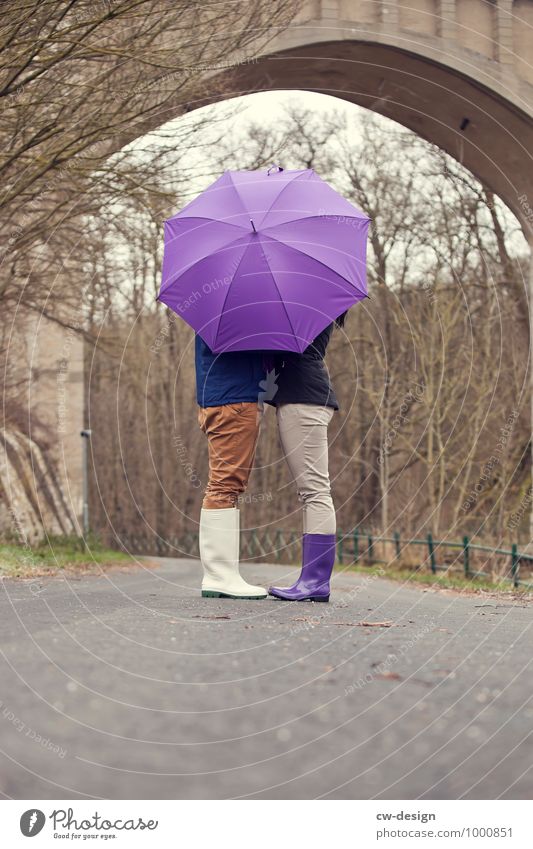 Couple in love hiding behind umbrella Wedding couple Caresses Love affair Sunshade Umbrella Matrimony Umbrellas & Shades affectionately game of hide-and-seek