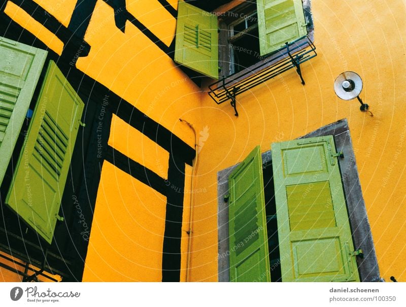 yellow-green Yellow Green Pea green Multicoloured Window Shutter Lamp Half-timbered facade France Alsace Facade Close Undo Detail Orange Colour