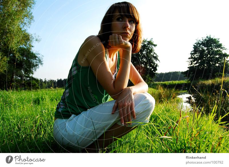 Scared? Meadow Green Grass Blade of grass Woman Summer Fear Exterior shot Tree Brook Lower Saxony Mistrust Thin White Pants River Blue Sky Sun Eyes