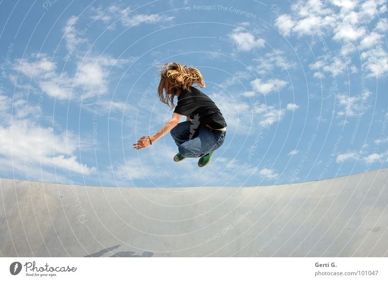 high-flying Jump Sky blue Clouds Bad weather Happiness Force Exuberance Playing Location Summery Glide Man Young man Long-haired Blonde T-shirt Chucks Footwear