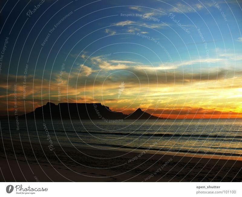 Into Darkness Sunset Beach Landmark Monument Coast Sky table mountain Cape Town sea ocean evening