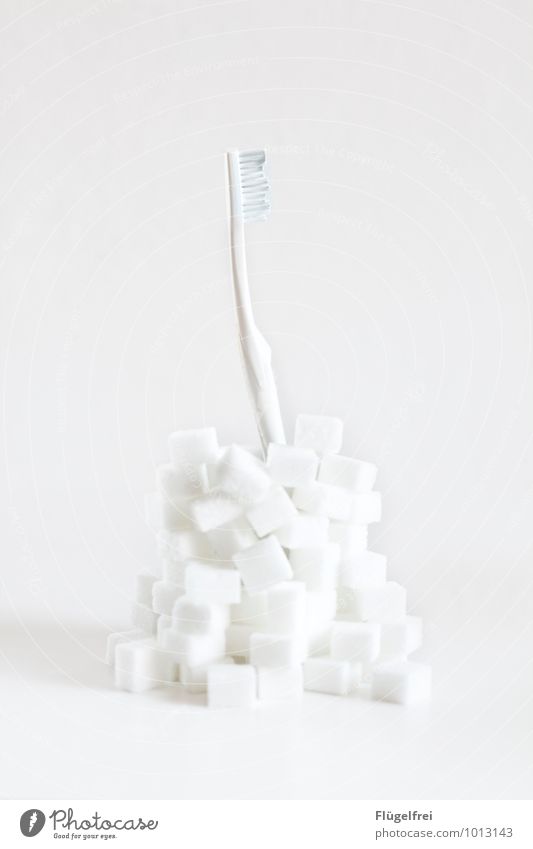 Sugar makes teeth whiter Food White Unhealthy Toothbrush Stack Lump sugar Teeth Nutrition Beautiful Dental care Fatty food Calorie industrial sugar Colour photo