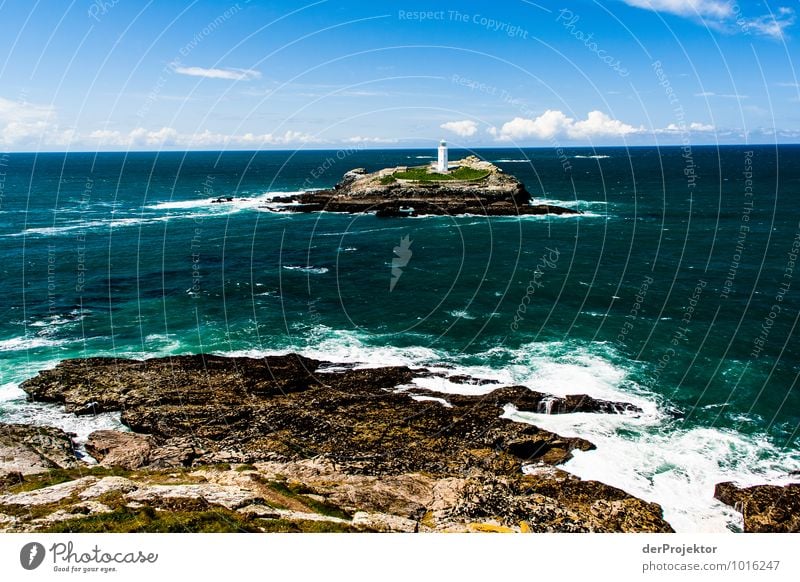 Lighthouse in the green sea Vacation & Travel Tourism Far-off places Freedom Environment Nature Landscape Plant Spring Beautiful weather Rock Waves Coast Beach