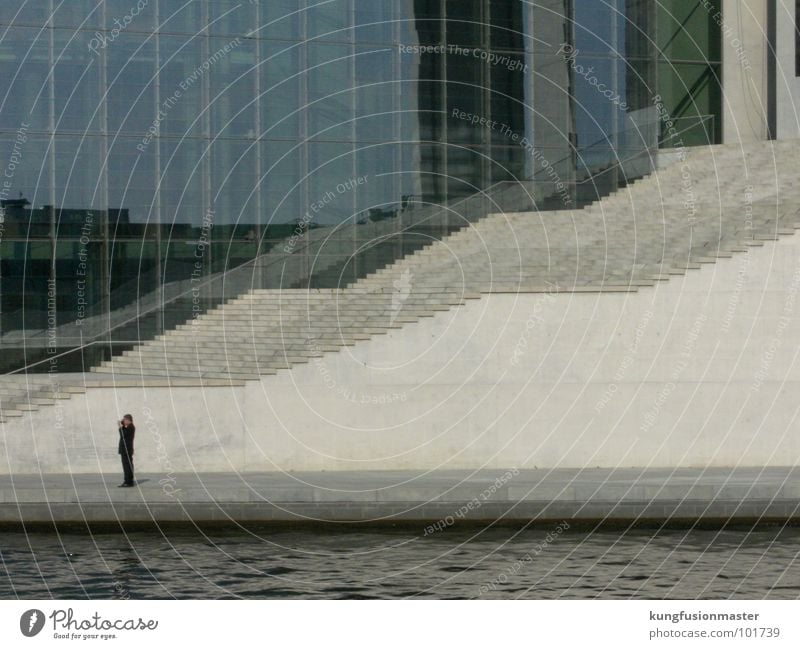 man with stairs Photographer Suit Wall (barrier) Concentrate Landmark Monument Stairs Reichstag River