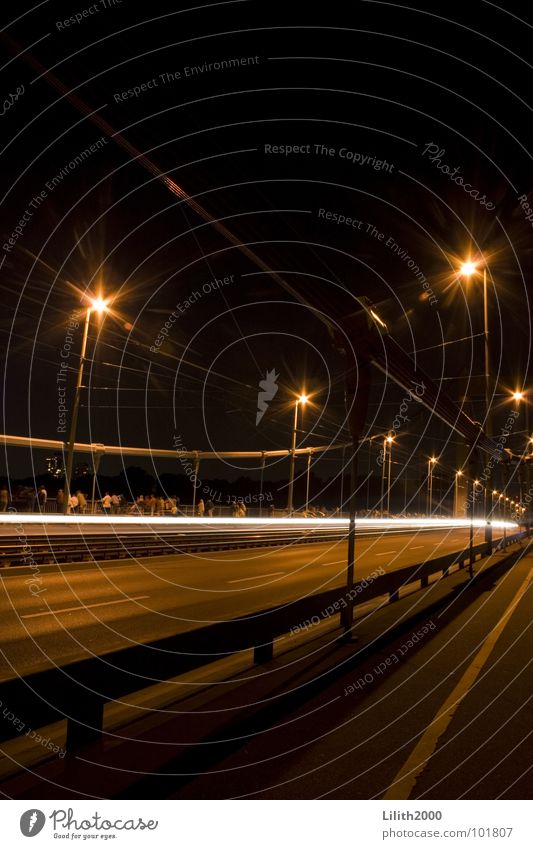 In the ecstasy of the night Rear light Night Lantern Light Stripe Audience Dark Transport Pedestrian Cologne Bridge Floodlight Lighting Handrail Mülheim Rhine