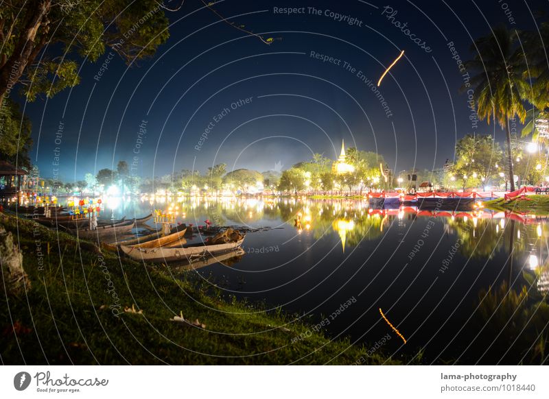 Festival of Lights festival of lights Water Night sky Palm tree Lakeside National Park Sukothai Thailand Asia Tourist Attraction Rowboat Illuminate Loi Krathong