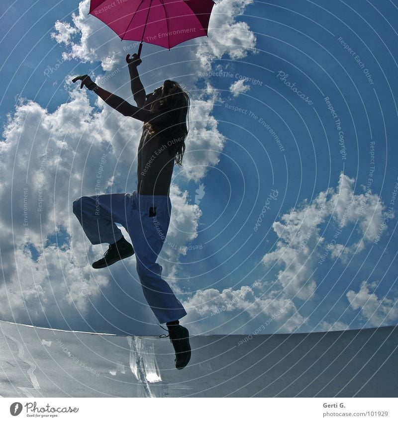 Young hopper Coincidence Man Young man Long-haired Blonde Thin Umbrella Patron Drought Pink White Jump Hop Gesture Clouds Heavenly Sky blue Summery Wind Gale