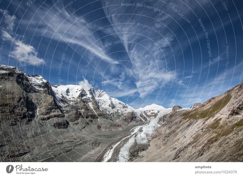 Landscape with high mountain peaks and melting glacier Beautiful Relaxation Summer Snow Mountain Environment Nature Sky Clouds Horizon Climate Climate change