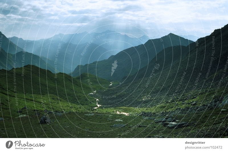 skylight Vacation & Travel High mountain region Mountaineering Peak Alpine pasture Meadow Brook Mountain stream Sunbeam Clouds Vail Rock Alps high alp Sky