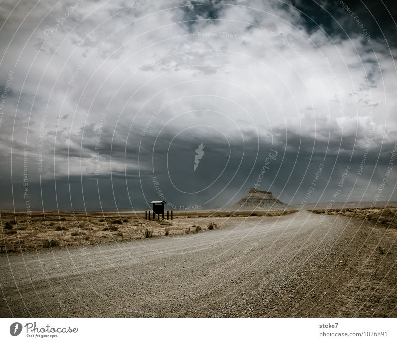 A journey into the unknown Bad weather Storm Gale Rock Mountain Desert Capitol Reef NP Lanes & trails Highway Threat Dark Far-off places Gigantic Gloomy Dry